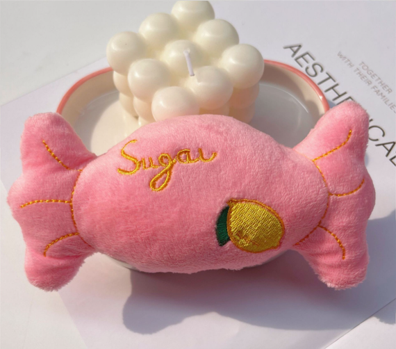 Іграшка для собак з пищалкою Цукерка рожевий