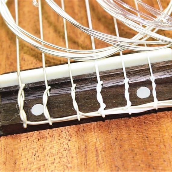 Струны струни НЕЙЛОНОВЫЕ СЕРЕБРЕННЫЕ для акустической классической гитары 028-043 на САМОЗАВЬЯЗКУ | Зображення 3