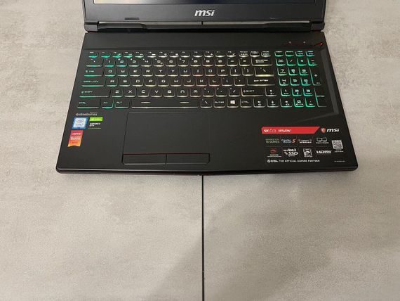 Игровой ноутбук MSI GL63 9SDK-840US / 15.6" (1920x1080) IPS / Intel Core i7-9750H (6 (12) ядер по 2.6 - 4.5 GHz) / 16 GB DDR4 / 512 GB SSD M.2 / nVidia GeForce GTX 1660 Ti, 6 GB GDDR6, 192-bit / WebCam б/у + Подарок Проводная мышь / USB | Зображення 3