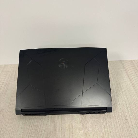 Игровой ноутбук Б-класс MSI Bravo 15 C7VFK / 15.6" (1920x1080) IPS / AMD Ryzen 7 7735HS (8 (16) ядер по 3.2 - 4.75 GHz) / 16 GB DDR5 / 512 GB SSD NVMe / nVidia GeForce RTX 4060, 8 GB GDDR6, 128-bit / WebCam б/у | Зображення 8
