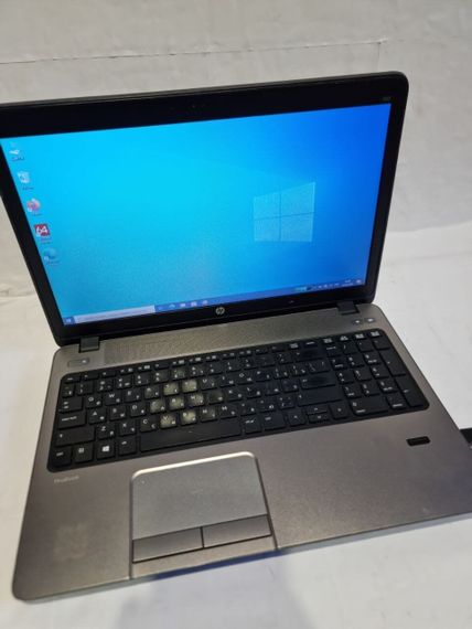 Ноутбук Б-клас HP ProBook 450 G1 / 15.6" (1366x768) TN / Intel Core i3-4000M (2 (4) ядра по 2.4 GHz) / 8 GB DDR3 / 240 GB SSD / Intel HD Graphic 4600 / WebCam / DVD-RW б/в | Зображення 1