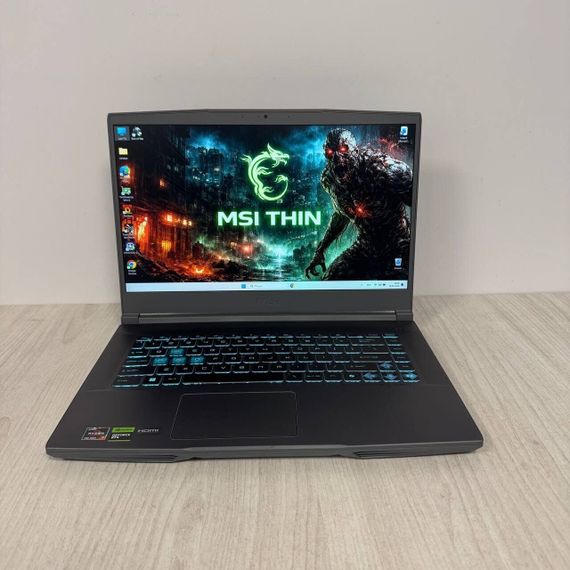 Ігровий ноутбук Б-клас MSI Thin A15 B7VE / 15.6" (1920x1080) IPS / AMD Ryzen 7 7735HS (8 (16) ядер по 3.2 - 4.75 GHz) / 16 GB DDR5 / 512 GB SSD NVMe / nVidia GeForce RTX 4050, 6 GB GDDR6, 96-bit / WebCam б/в | Зображення 1