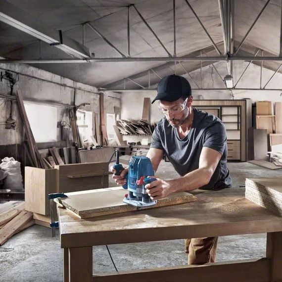 Bosch Фрезер GOF 130, 1300Вт, 11000-28000 об/хв, цанга 6 та 8мм, 3.5кг (0.601.6B7.000) | Зображення 4