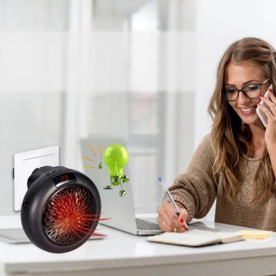 Портативний тепловентилятор мініобігрівач у розетку Wonder Heater 900W | Зображення 1