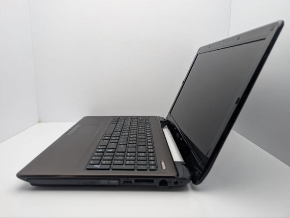 Ноутбук Asus K52N / 15.6" (1366x768) TN / AMD Athlon II P320 (2 ядра по 1.6 GHz) / 8 GB DDR3 / 320 GB HDD / AMD Radeon HD 4200 Graphics / WebCam / DVD-ROM / Без АКБ б/в | Зображення 4