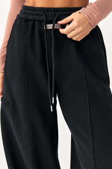 Однотонні теплі спортивні штани із затяжками внизу - чорний цвет, XL (є розміри) | Зображення 3