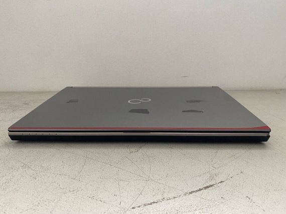 Мобільна робоча станція Б-клас Fujitsu Celsius H730 / 15.6" (1920x1080) TN / Intel Core i7-4900MQ (4 (8) ядра по 2.8 - 3.8 GHz) / 32 GB DDR3 / 512 GB SSD / nVidia Quadro K2100M, 2 GB GDDR5, 128-bit / WebCam б/в + Подарунок Зубна щітка Colgate | Зображення 4