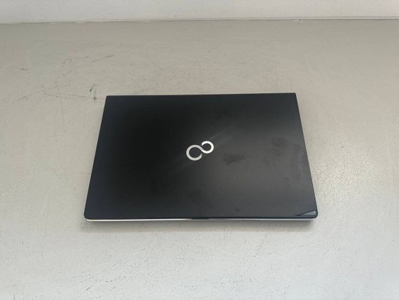 Ультрабук Б-класс Fujitsu LifeBook S935 / 13.3" (1920x1080) IPS / Intel Core i7-5600U (2 (4) ядра 2.6 - 3.2 GHz) / 8 GB DDR3 / 256 GB SSD / Intel HD Graphics 5500 / WebCam / VGA б/у | Зображення 4