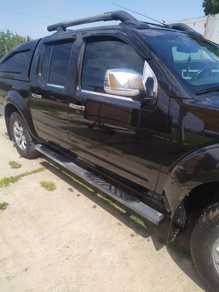 Накладка на вітровички (2 шт., нерж.) для Nissan Navara 2006-2015 рр. | Зображення 1