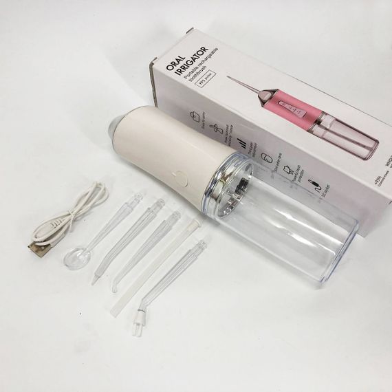 Іригатор для чищення зубів та порожнини рота Oral Irrigator з акумулятором та змінними насадками. Колір: білий UC-52 | Зображення 6