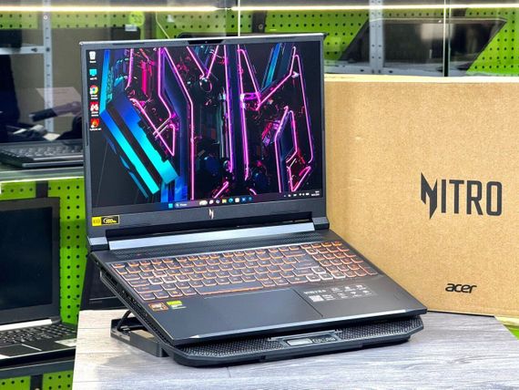 Ігровий ноутбук Acer Nitro V16 ANV16-61 / 16" (1920x1200) IPS / AMD Ryzen AI 7 350 (8 (16) ядер по 2.0 - 5.0 GHz) / 16 GB DDR5 / 1000 GB SSD NVMe / nVidia GeForce RTX 5060, 8 GB GDDR7, 128-bit / WebCam / Win 11 б/в | Зображення 2