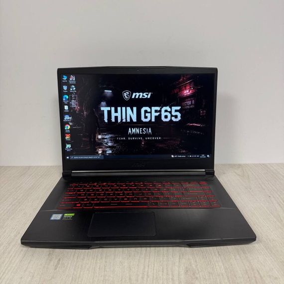 Ігровий ноутбук Б-клас MSI GF65 Thin 9SEXR / 15.6" (1920x1080) IPS / Intel Core i7-9750H (6 (12) ядра по 2.6 - 4.5 GHz) / 8 GB DDR4 / 512 GB SSD M.2 / nVidia GeForce RTX 2060, 6 GB GDDR6, 192-bit / WebCam б/в | Зображення 1