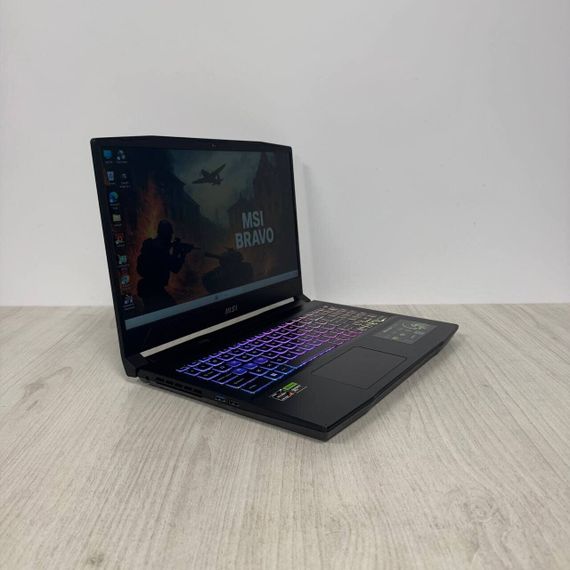 Игровой ноутбук Б-класс MSI Bravo 15 C7VFK / 15.6" (1920x1080) IPS / AMD Ryzen 7 7735HS (8 (16) ядер по 3.2 - 4.75 GHz) / 16 GB DDR5 / 512 GB SSD NVMe / nVidia GeForce RTX 4060, 8 GB GDDR6, 128-bit / WebCam б/у | Зображення 4