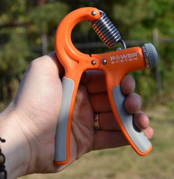 Еспандер кистьовий Power System PS-4021 з регульованим навантаженням 10-40 кг.  Power Hand Grip Orange | Зображення 4