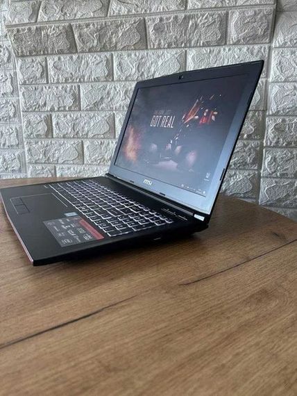 Ноутбук MSI GP62 Leopard 6RF 15,6" FHD i7 6700HQ 8Gb SSD128Gb+HDD1Tb GTX 1060  Б/В | Зображення 4