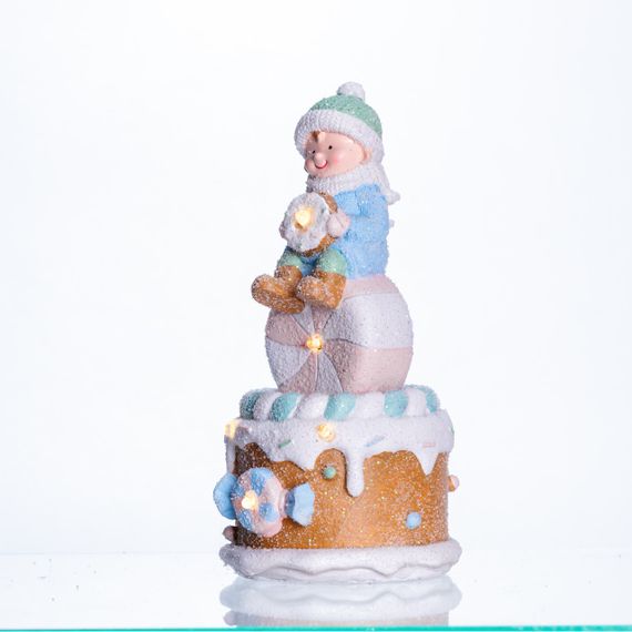 Новорічна декоративна фігурка з підсвіткою 10.5×10.5×20.5 см Новорічний декор Дитина на "солодкій башті" з порцеляни CR-6-14 | Зображення 1