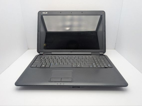 Ноутбук Asus K50C / 15.6" (1366x768) TN / Intel Celeron 220 (1 ядро по 1.2 GHz) / 4 GB DDR2 / 120 GB HDD / Intel Graphics / WebCam / DVD-ROM / АБК не тримає б/в | Зображення 2