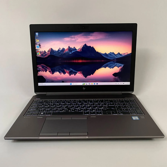 Мобільна робоча станція Б-клас HP ZBook 15 G5 / 15.6" (1920x1080) IPS / Intel Core i7-8850H (6 (12) ядра по 2.6 - 4.3 GHz) / 16 GB DDR4 / 240 GB SSD / nVidia Quadro P1000, 4 GB GDDR5, 256-bit / Fingerprint / WebCam б/в + Подарунок Бездротова миша / USB | Зображення 1