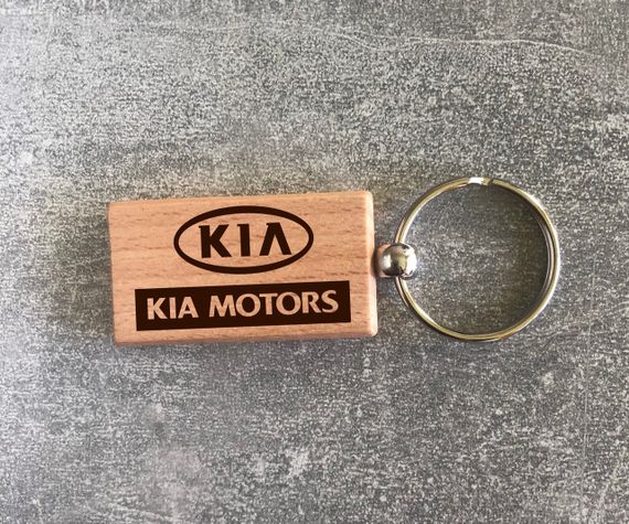 Деревянный брелок с логотипом KIA MOTORS (15010102001) | Зображення 1