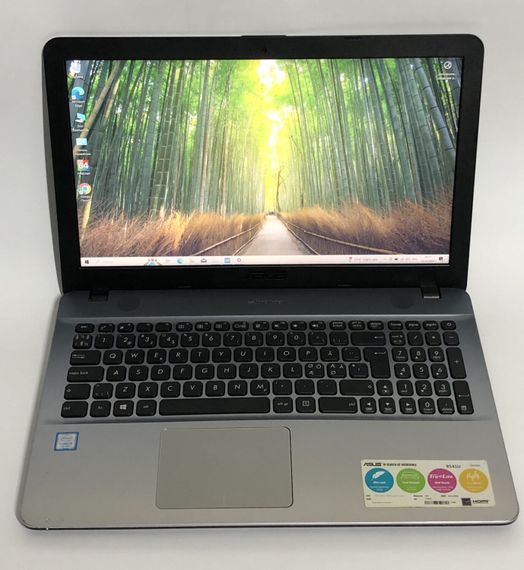 Ноутбук Б-класс Asus R541U / 15.6" (1920x1080) TN / Intel Core i5-7200U (2 (4) ядра по 2.5 - 3.1 GHz) / 4 GB DDR4 / 128 GB SSD / Intel HD Graphics 620 / WebCam / Win 10 Home б/у | Зображення 1