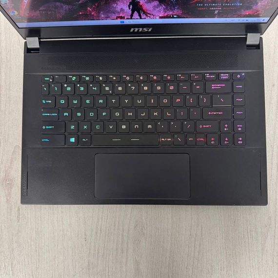 Игровой ноутбук Б-класс MSI GS66 Stealth 11UH / 15.6" (1920x1080) IPS / Intel Core i9-11900H (8 (16) ядер по 2.5 - 4.9 GHz) / 16 GB DDR4 / 512 GB SSD / nVidia GeForce RTX 3080, 16 GB GDDR6, 256-bit / WebCam б/у | Зображення 2