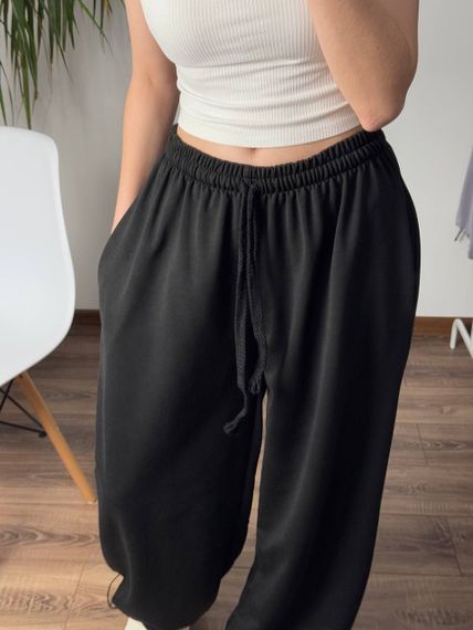 Женские широкие свободные штаны трикотажные на затяжках снизу SS700 цвет черный, размер onesize 42/46 | Зображення 2
