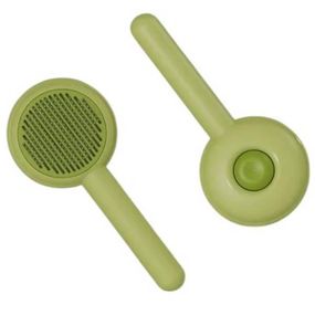 Щетка для вычесывания шерсти животных круглая Зеленая