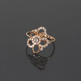 Кольцо из красного золота с топазом и фианитами 19