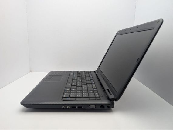 Ноутбук Asus K50C / 15.6" (1366x768) TN / Intel Celeron 220 (1 ядро по 1.2 GHz) / 4 GB DDR2 / 120 GB HDD / Intel Graphics / WebCam / DVD-ROM / АБК не тримає б/в | Зображення 4