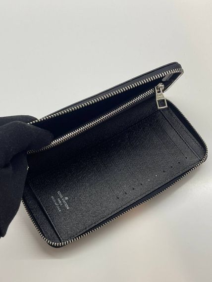 Вертикальний гаманець Louis Vuitton Zippy сірий | Зображення 2