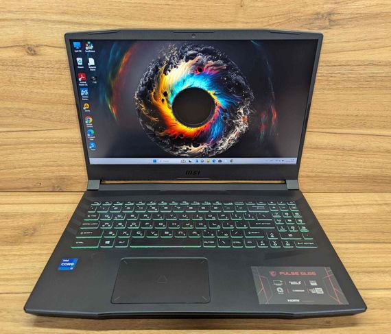 Ігровий ноутбук MSI Pluse GL66 11UGKV / 15,6" (1920x1080) IPS / Intel Core i7-11800H (8 (16) ядер по 2,3 - 4,6 ГГц) / 16 ГБ DDR4 / 512 ГБ SSD / nVidia GeForce RTX 3070, 8 ГБ GDDR6, 256-біт / WebCam / Windows б/в + Подарунок  Нова бездротова миша / USB | Зображення 1