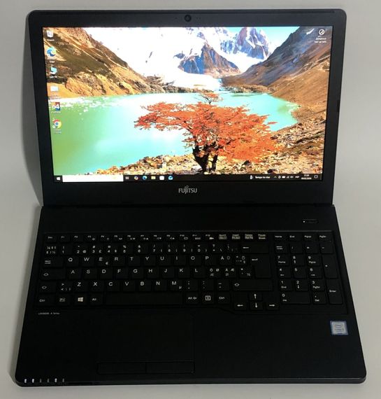 Ноутбук Fujitsu LifeBook A357 / 15.6" (1920x1080) IPS / Intel Core i5-7200U (2 (4) ядра по 2.5 - 3.1 GHz) / 8 GB DDR4 / 128 GB SSD / Intel HD Graphics 620 / WebCam / Win 10 Pro б/в | Зображення 1