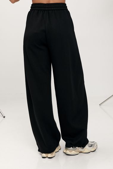 Вільні однотонні спортивні штани - чорний цвет, L (є розміри) | Зображення 1