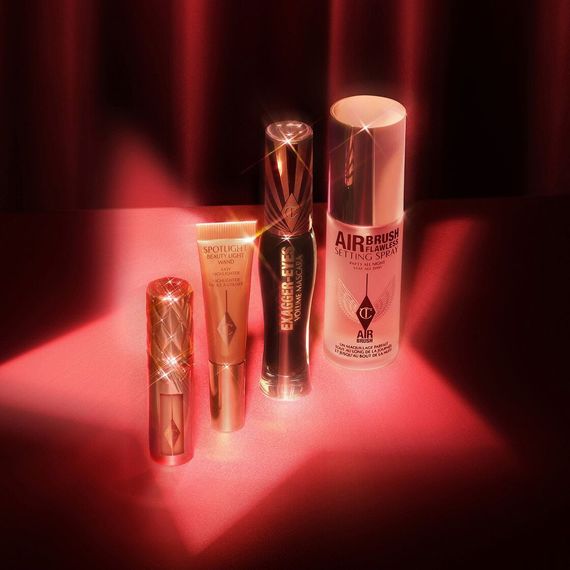Подарочный набор Charlotte Tilbury Charlotte's Iconic Hollywood Beauty Secrets (тушь, спрей для фиксации макияжа, хайлайтер, блеск для увеличения объема губ) | Зображення 1