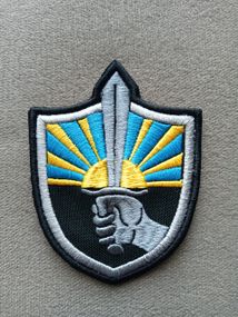 Шеврон Донбас Рука з мечем