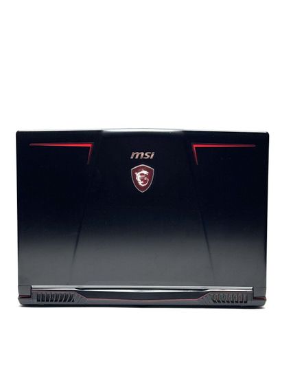 Ігровий ноутбук Б-клас MSI Raider GE63VR / 15.6" (1920x1080) TN / Intel Core i7-7700HQ (4 (8) ядра по 2.8 - 3.8 GHz) / 16 GB DDR4 / 256 GB SSD / nVidia GeForce GTX 1070, 8 GB GDDR5, 256-bit / WebCam / Win 10 Pro б/в | Зображення 2