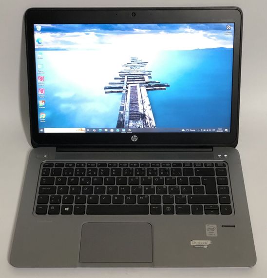 Ультрабук Б-клас HP EliteBook Folio 1040 G1 / 14" (1600x900) IPS / Intel Core i5-4210U (2 (4) ядра по 1.7 - 2.7 GHz) / 4 GB DDR3 / 128 GB SSD / Intel HD Graphics 4400 / WebCam / Win 10 Pro б/в | Зображення 1