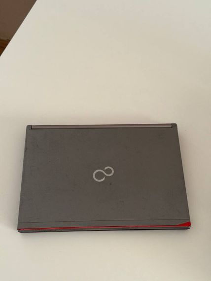 Ноутбук Б-класс Fujitsu LifeBook E734 / 13.3" (1920x1080) TN / Intel Core i5-4210M (2 (4) ядра по 2.6 - 3.2 GHz) / 8 GB DDR3 / 128 GB SSD / Intel HD Graphics 4600 / WebCam / Windows 10 б/у | Зображення 6