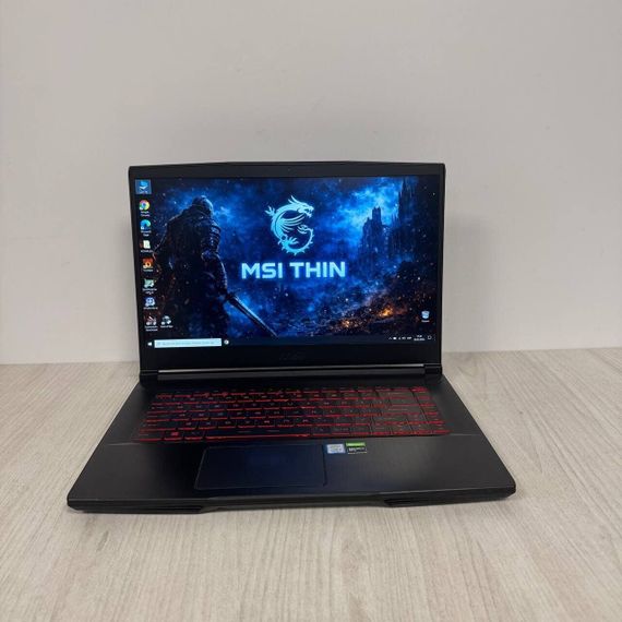 Игровой ноутбук MSI GF63 Thin 9SCXR / 15.6" (1920x1080) IPS / Intel Core i5-9300H (4 (8) ядра по 2.4 - 4.1 GHz) / 16 GB DDR4 / 512 GB SSD / nVidia GeForce GTX 1650 Max-Q, 4 GB GDDR6, 128-bit / WebCam б/у | Зображення 1