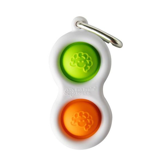 Брелок-антистрес Fat Brain Toys Simpl Dimpl Кнопки 4 кольори в асорт. (F2111ML) | Зображення 1