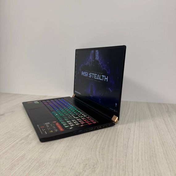 Ігровий ноутбук Б-клас MSI GS75 Stealth 9SF / 17.3" (1920x1080) IPS / Intel Core i7-10875H (8 (16) ядер по 2.3 - 5.1 GHz) / 16 GB DDR4 / 512 GB SSD / nVidia GeForce RTX 2060, 6 GB GDDR6, 192-bit / WebCam б/в | Зображення 3