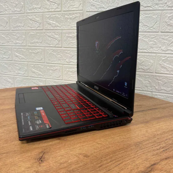 Ноутбук MSI GL63 Leopard 8RC FHD IPS i5 8300H 8GB SSD 128GB HDD 1TB GTX 1050 Б/В | Зображення 6