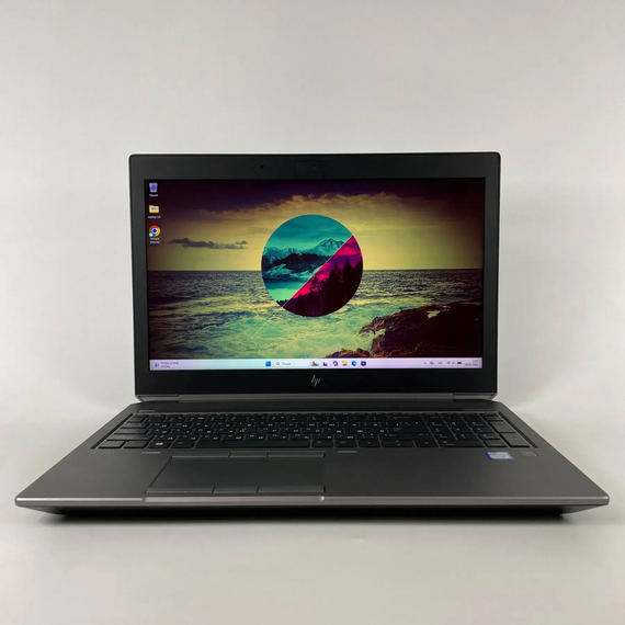 Мобільна робоча станція Б-клас HP zBook 15 G5 / 15.6" (1920x1080) IPS / Intel Xeon E-2176M (6 (12) ядер по 2.7 - 4.4 GHz) / 16 GB DDR4 / 128 GB SSD + 500 GB HDD / nVidia Quadro P2000, 4 GB GDDR5, 128-bit / WebCam / TouchID б/в + Подарунок Миша | Зображення 1