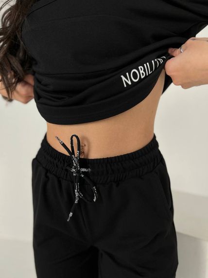 Женский спортивный прогулочный костюм с укороченными штанами NB24003 черный, размер 46/48 | Зображення 4