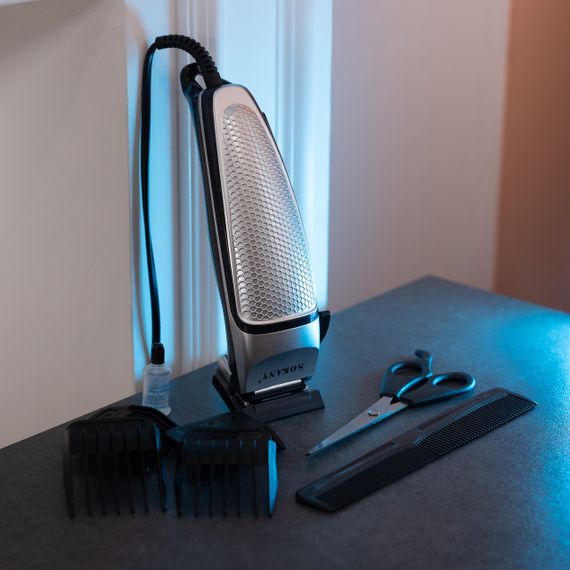 Машинка для стрижки волос Sokany SK-4643 электрическая  универсальная 4 насадки Серебристая | Зображення 5