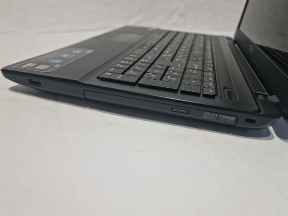 Ноутбук Б-класс Asus X54C / 15.6" (1366x768) TN / Intel Celeron B820 (2 ядра по 1.7 GHz) / 8 GB DDR3 / 120 GB SSD / Intel HD Graphics / WebCam / DVD-RW / Win 10 / АКБ не держит б/у | Зображення 4