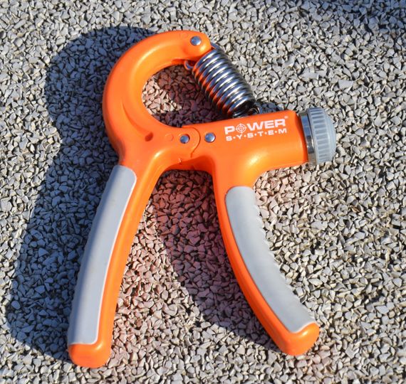 Еспандер кистьовий Power System PS-4021 з регульованим навантаженням 10-40 кг.  Power Hand Grip Orange | Зображення 3