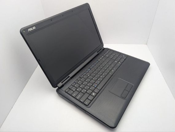Ноутбук Asus K50C / 15.6" (1366x768) TN / Intel Celeron 220 (1 ядро по 1.2 GHz) / 4 GB DDR2 / 120 GB HDD / Intel Graphics / WebCam / DVD-ROM / АБК не тримає б/в | Зображення 5