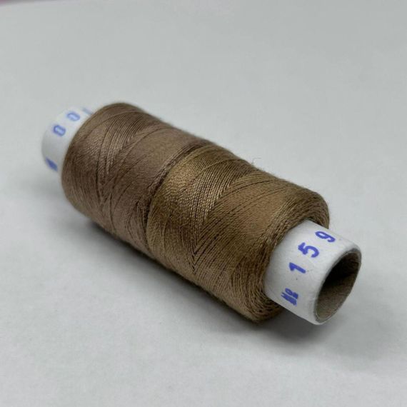 100/159 Нитки в катушках 40/2 , половинки (катушка 2х75м) | Зображення 1