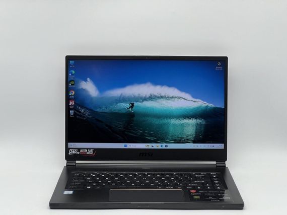 Ігровий ноутбук Б-клас MSI GS65 Stealth MS-16Q4 / 15.6" (1920x1080) IPS / Intel Core i7-9750H (6 (12) ядра по 2.6 - 4.5 GHz) / 16 GB DDR4 / 960 GB SSD / nVidia GeForce RTX 2080 Max-Q, 8 GB GDDR6, 256-bit / WebCam б/в + Подарунок Бездротова миша HOCO GM28 | Зображення 1